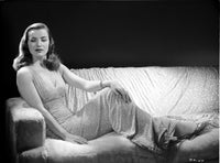Ella Raines reclining in classic dress photo print