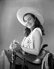 Ella Raines vintage photo print in a sleeveless top, classic Hollywood style.