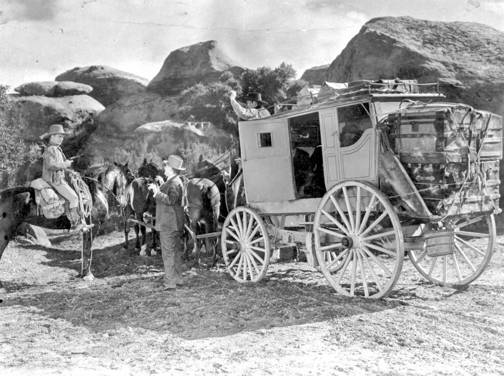 A Scene from The Oklahoma Kid Photo Print showcasing classic film artistry.
