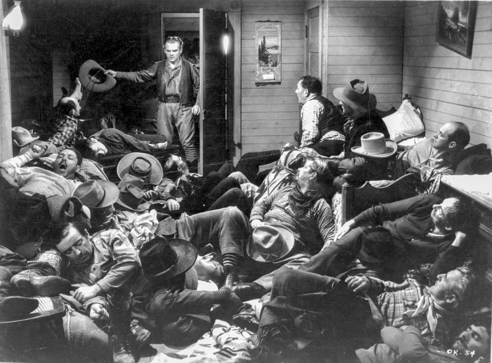 A scene from The Oklahoma Kid photo print showcasing classic cinema.