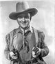 A Scene From the Oklahoma Kid Photo Print capturing classic Western cinema.