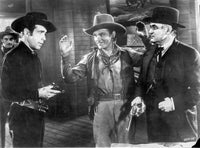 Photo print of a scene from The Oklahoma Kid, classic film decor.