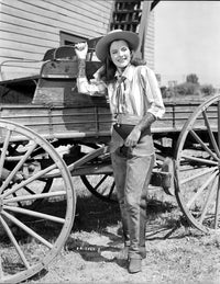 Ella Raines posed in cowgirl attire photo print, vintage Western style.