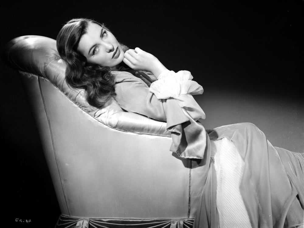 Ella Raines posed photo print in a glamorous gown.