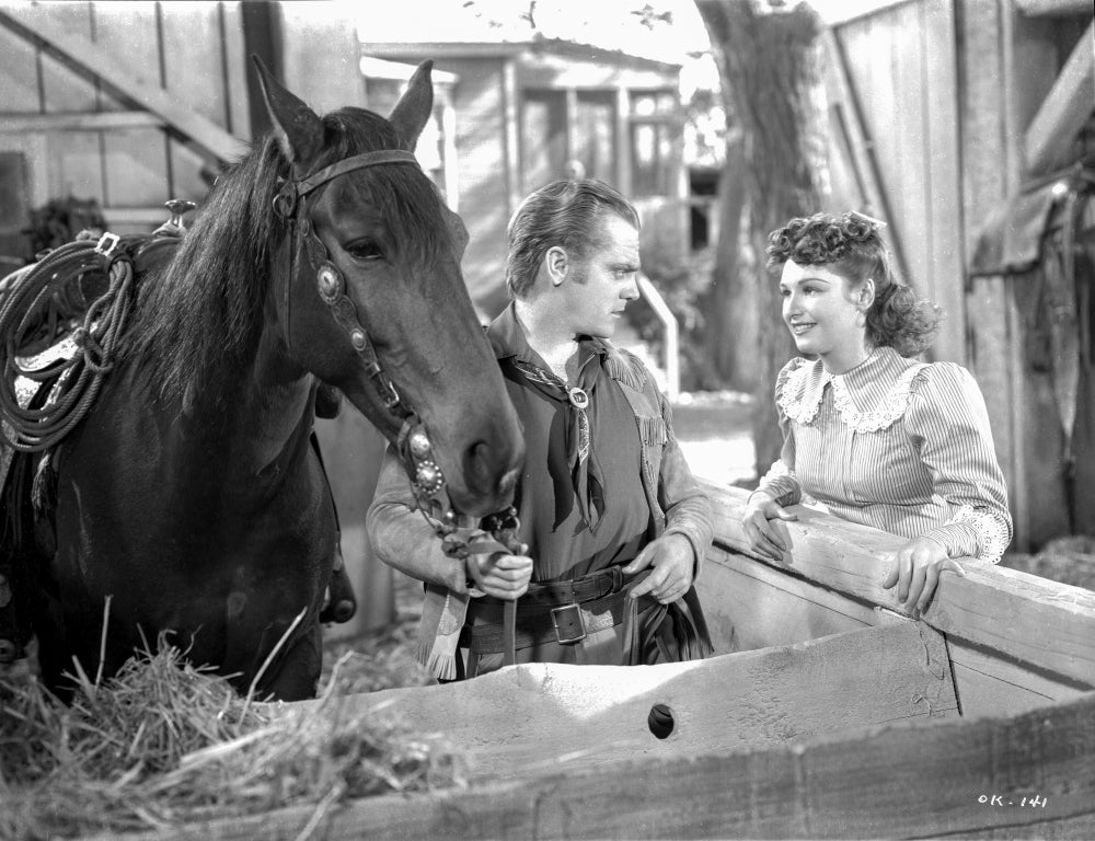 The Oklahoma Kid scene photo print showcasing classic cinema.