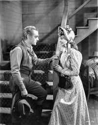 A Scene From the Oklahoma Kid Photo Print showcasing a classic movie scene.