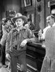 A Scene From the Oklahoma Kid photo print showcasing classic cinema art.