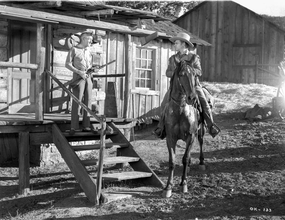 Photo print of a scene from The Oklahoma Kid, available in multiple sizes.