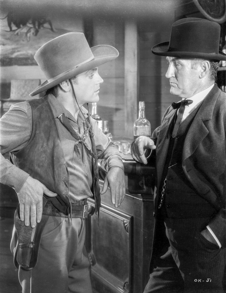 A Scene From the Oklahoma Kid Photo Print showcasing classic cinema.