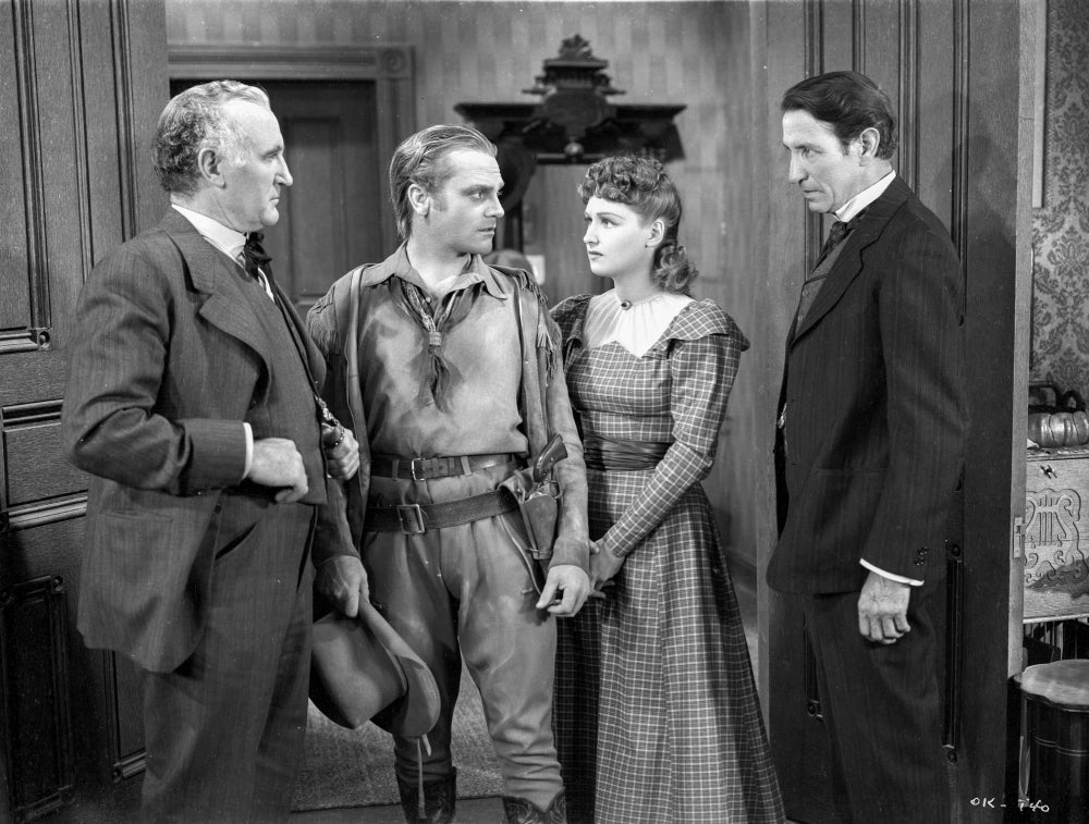 Photo print of a scene from The Oklahoma Kid, showcasing classic western film imagery.