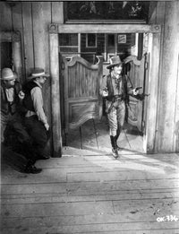 A Scene From the Oklahoma Kid Photo Print showcasing a classic film moment.