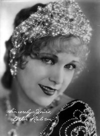 Esther Ralston photo print in embroidered top and head dress.