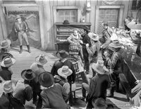 A scene from The Oklahoma Kid photo print showcasing classic cinema.