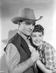 A Scene From the Oklahoma Kid Photo Print showcasing classic cinema.