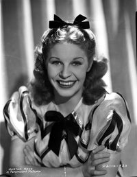 Martha Raye smiling in stripe puff sleeves photo print.