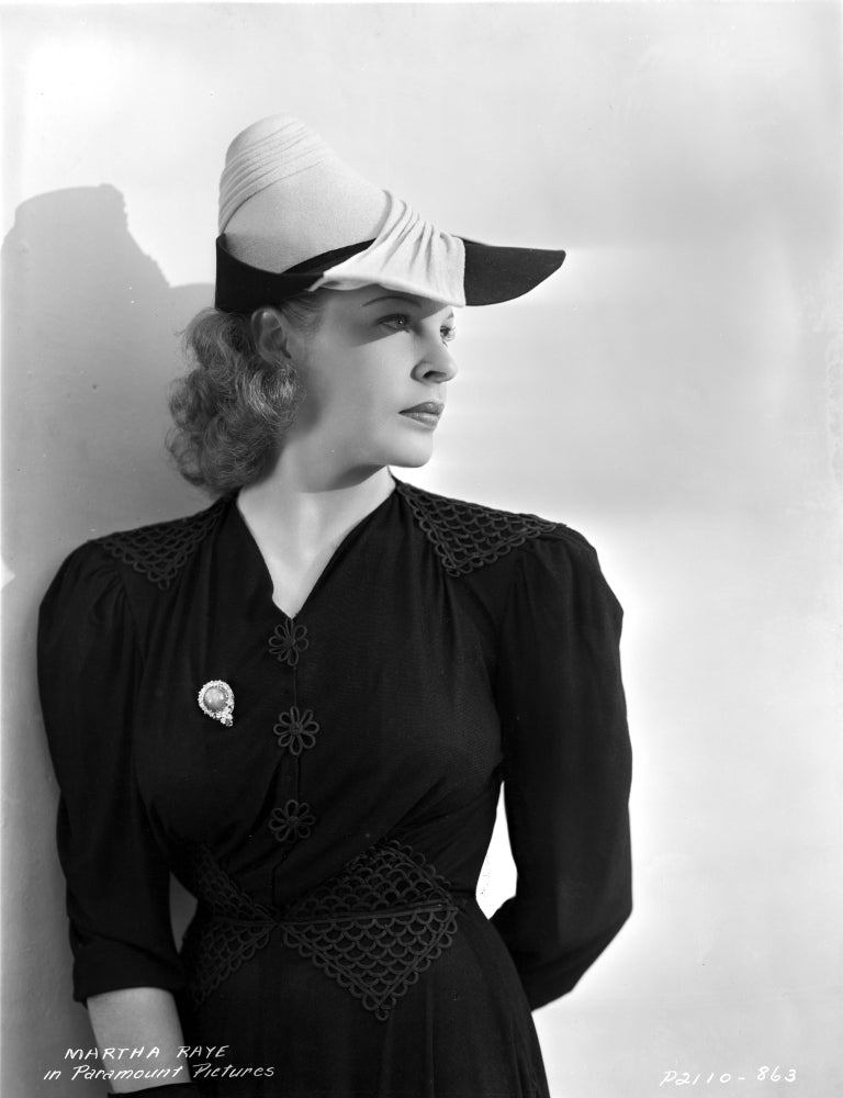 Martha Raye Leaning on the Wall Photo Print in Black Coat