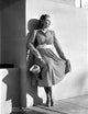 Martha Raye portrait photo print in a dress and leaning pose.