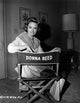 Donna Reed seated on an actor's chair photo print
