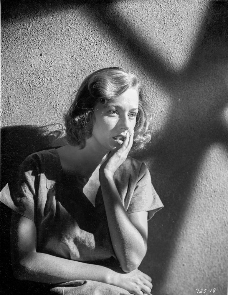A Scene From Caged Photo Print on premium quality paper.