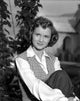 Debbie Reynolds photo print featuring her in a colorful vest.