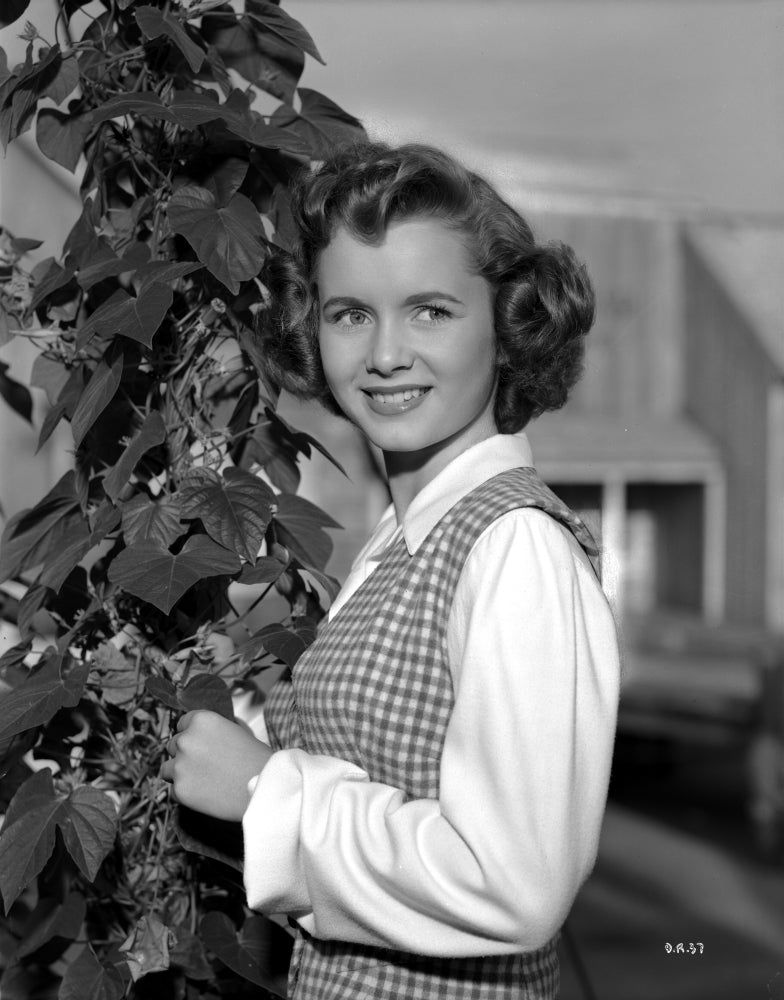 Debbie Reynolds smiling photo print on a checkered top.