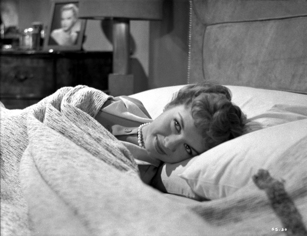Debbie Reynolds Lying on a Bed Portrait Photo Print