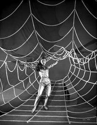 Debbie Reynolds photo print spreading her hand on a spider web