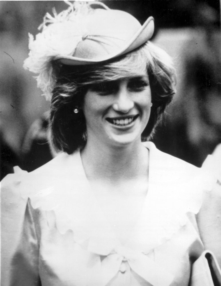 Princess Diana wearing a feather hat photo print