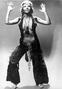 Ingrid Pitt posed in a classic photo print, capturing her iconic presence.