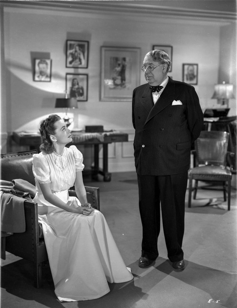 A Scene From My Love Came Back Photo Print showcasing a romantic scene from the classic film.