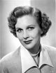 Lynn Roberts posed in formal dress with necklace photo print.