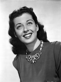 Gail Russell smiling in a dress with a white background photo print