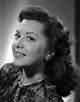 Ann Rutherford smiling photo print, celebrating classic Hollywood charm.