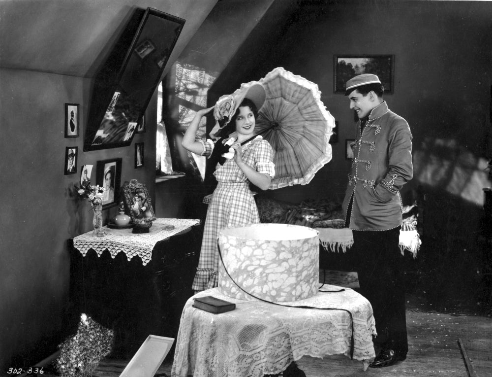 Norma Shearer classic photo print capturing a couple talking.