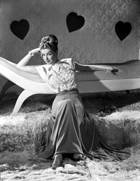Ann Sheridan classic photo print sitting on the floor leaning against a chair