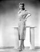 Ann Sheridan leaning on the table classic photo print.