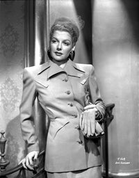 Ann Sheridan leaning on a chair in a stylish coat dress photo print.