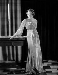Sylvia Sidney standing in an elegant gown photo print