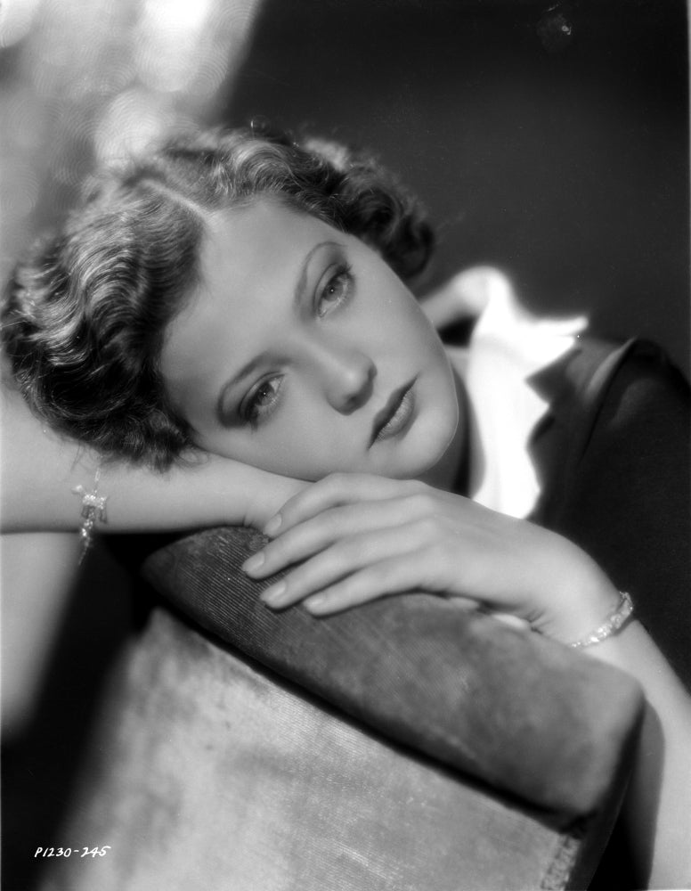 Sylvia Sidney Lying in a Black and White Blouse Photo Print