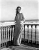 Sylvia Sidney wearing a blazer with hands in pockets photo print.