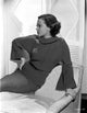 Sylvia Sidney reclining on a couch in a long sleeve blouse photo print