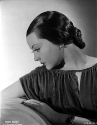 Sylvia Sidney wearing a ruffled blouse photo print