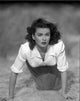 A Scene From the Woman on the Beach Photo Print showcasing serene coastal life.