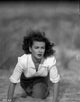 A Scene From the Woman on the Beach Photo Print showcasing a serene coastal landscape.