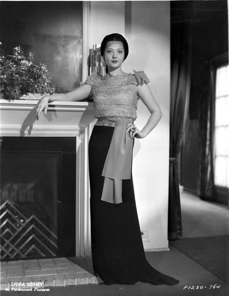 Sylvia Sidney Beside the Fireplace Photo Print