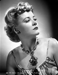 Penny Singleton portrait photo print wearing flower necklace.