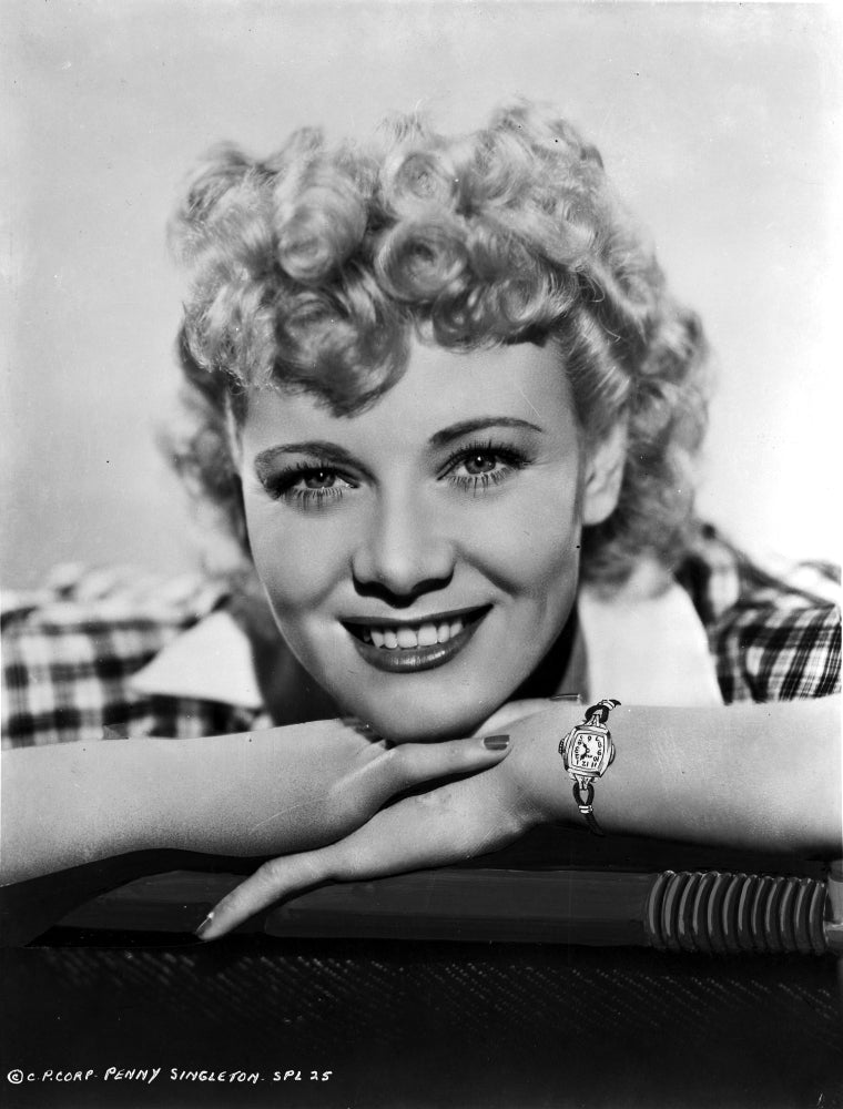 Penny Singleton smiling close-up portrait photo print on white background.