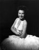 Ginny Simms smiling in white gown photo print