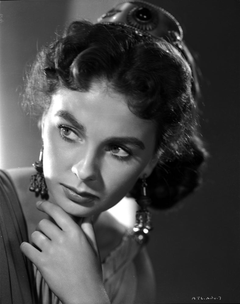 Jean Simmons portrait in white pleated shoulder dress and fringe earrings photo print.