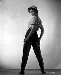 Jean Simmons posed in white gingham shirt and black pants photo print